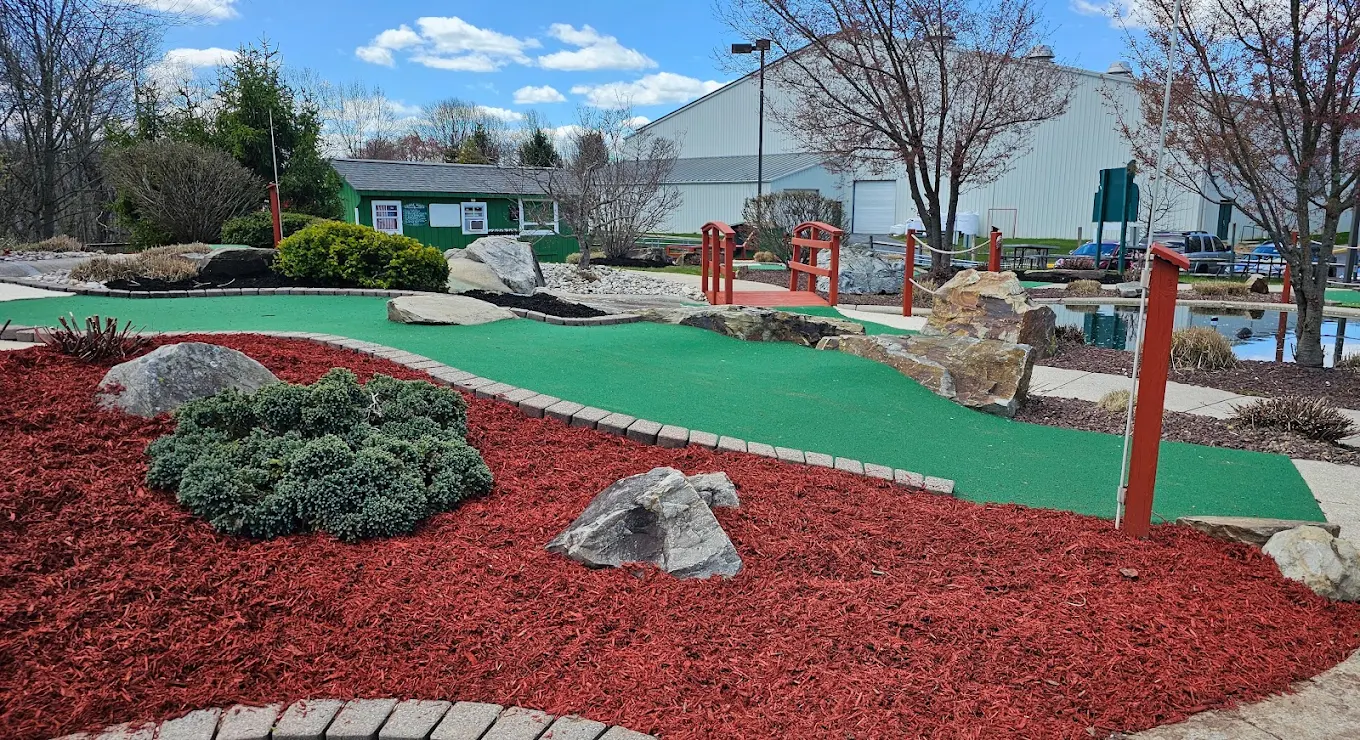 Bridge with red mulch landscaping
