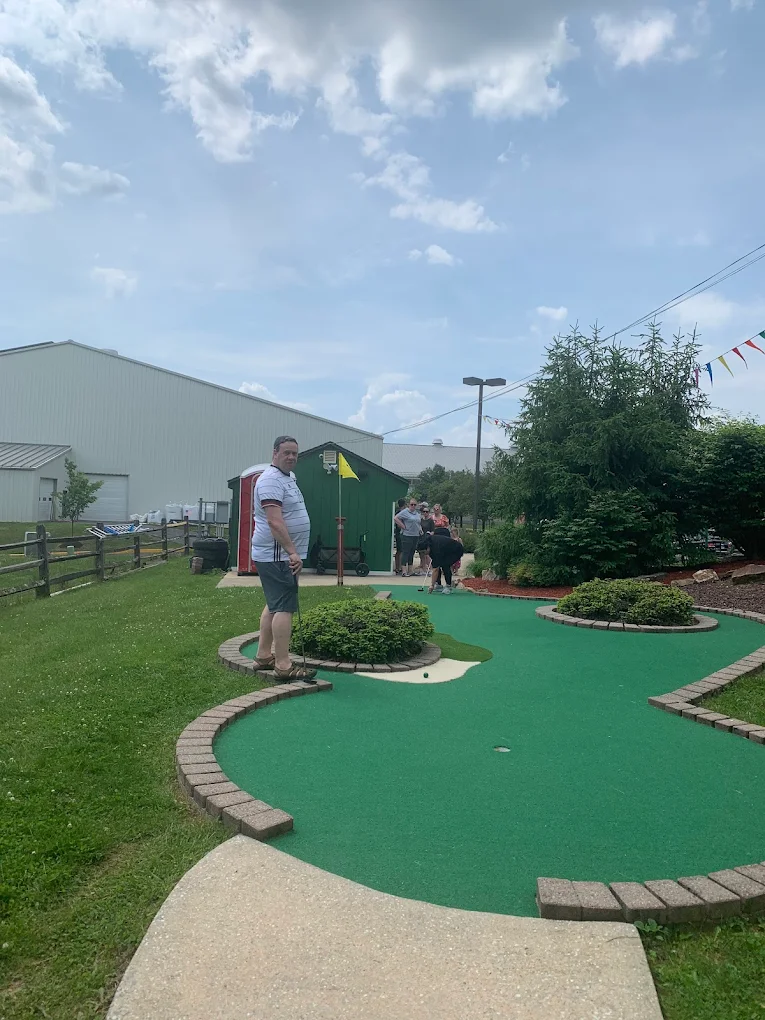 Guest putting on a green